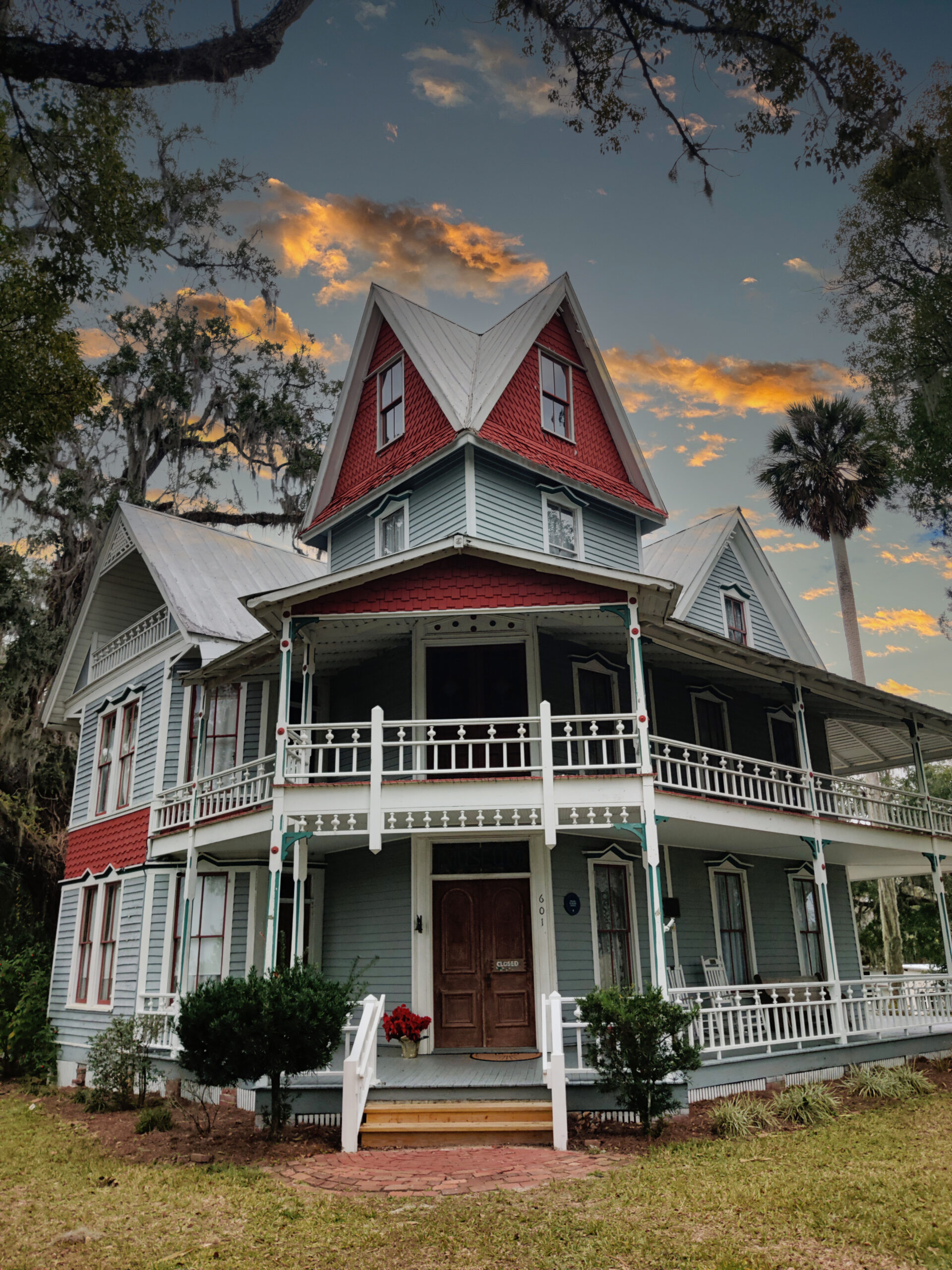 May-Stringer House A blue and red four-story Victorian home known as the May-Stringer House